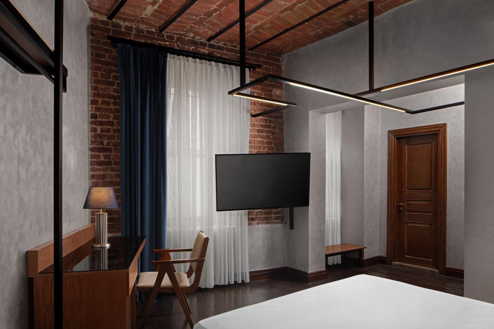 德卡蒙多加拉塔酒店 伊斯坦布尔 外观 照片 A room at the hotel