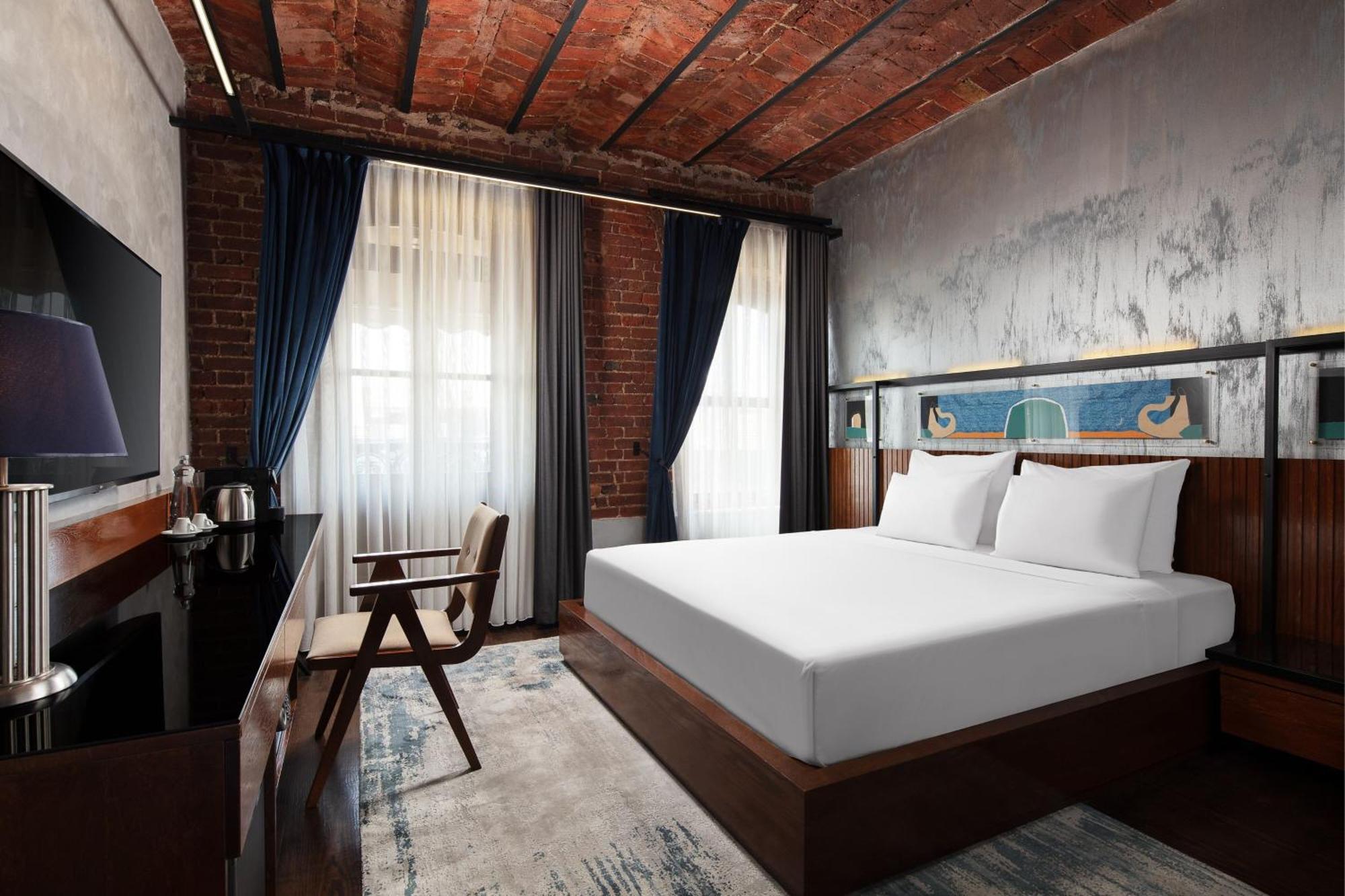 德卡蒙多加拉塔酒店 伊斯坦布尔 外观 照片 A room at the hotel