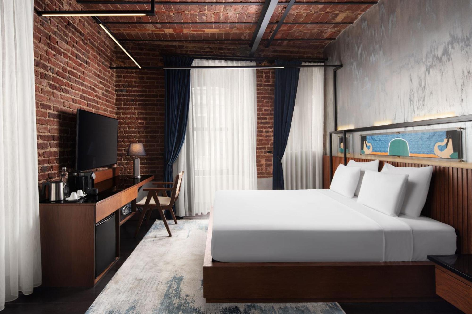 德卡蒙多加拉塔酒店 伊斯坦布尔 外观 照片 A rendering of a guest room at the forthcoming Hotel Indigo in the South Loop.