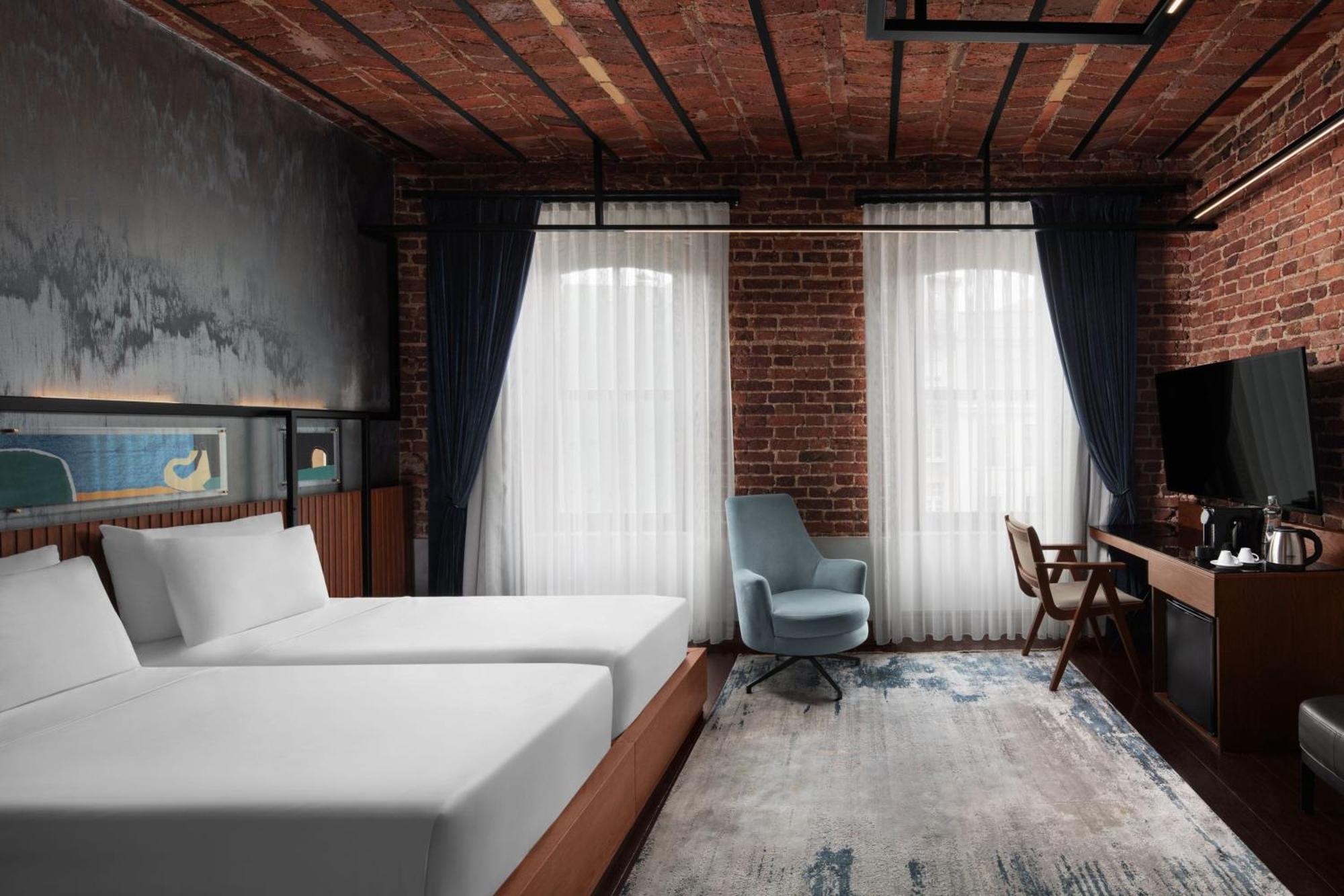 德卡蒙多加拉塔酒店 伊斯坦布尔 外观 照片 A room at the hotel