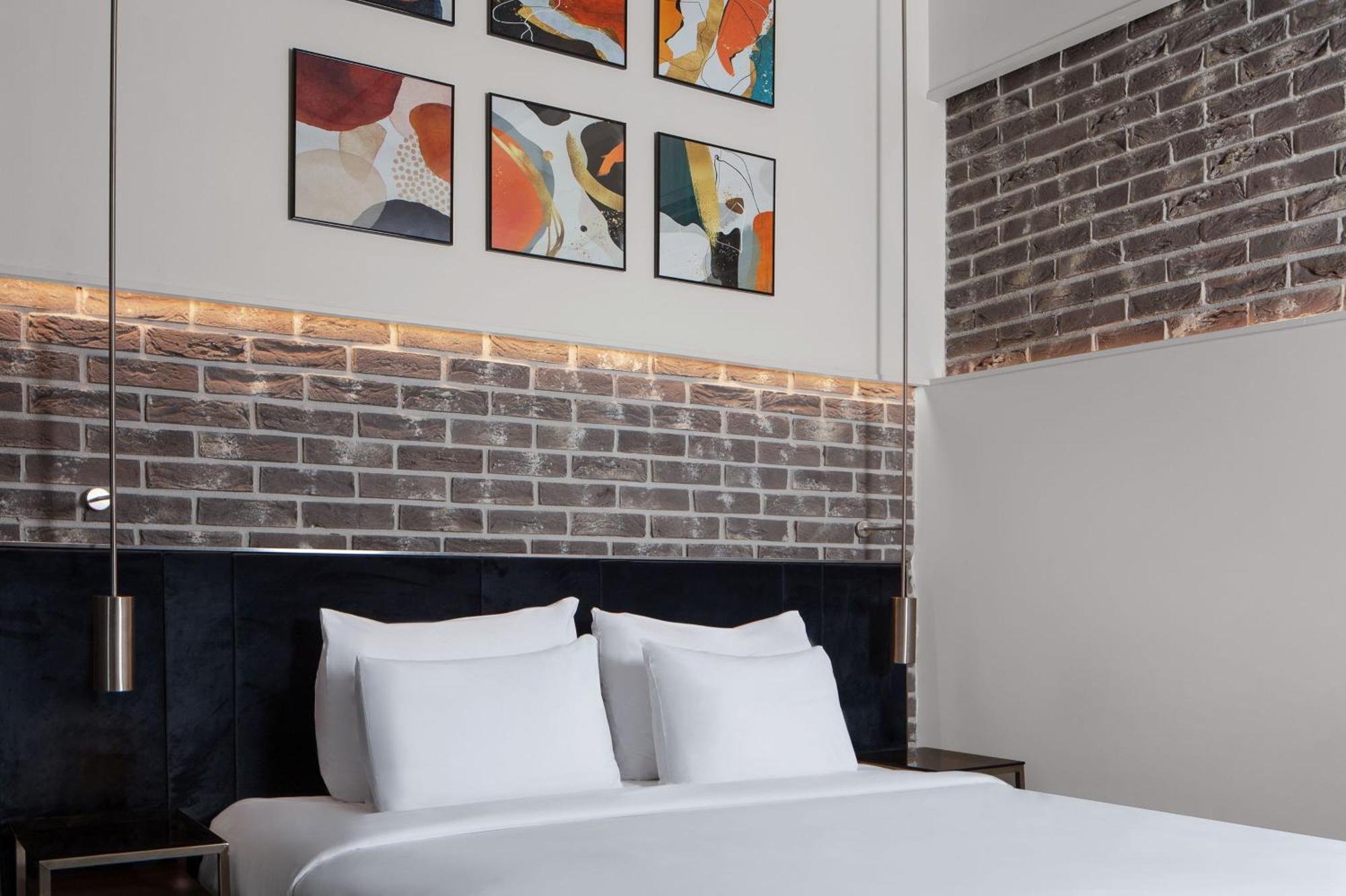 德卡蒙多加拉塔酒店 伊斯坦布尔 外观 照片 A bedroom at the hotel
